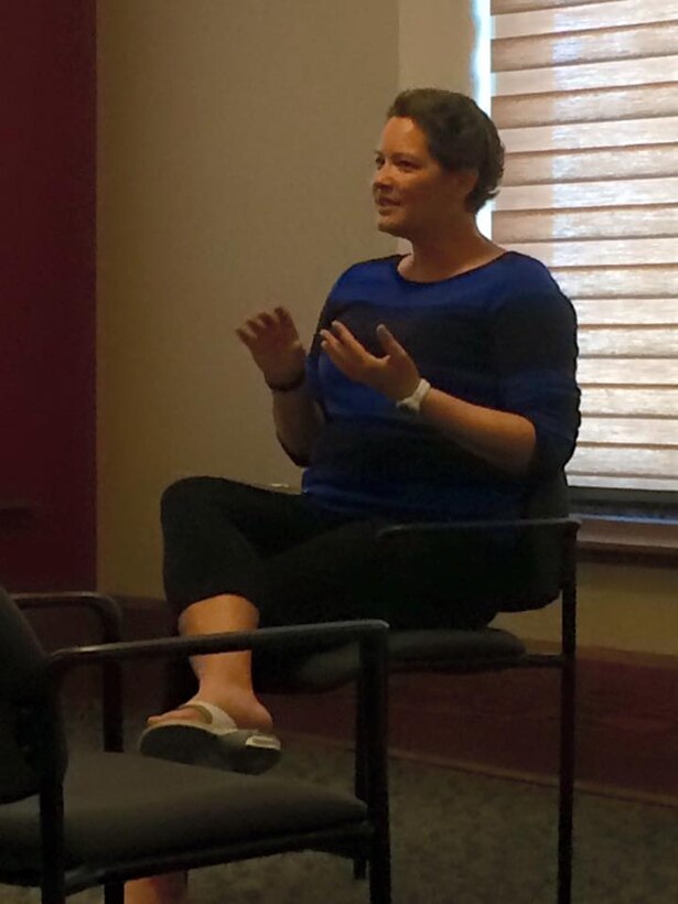 Laura Markuly, 349th Air Refueling Squadron administration assistant, speaks to an audience about her experience with breast cancer, April 21, 2016, at Cheney, Kan.  Markuly’s positive outlook and determination has helped her overcome the difficulties of breast cancer, and now she strives to support others during their hardships. (Courtesy photo)