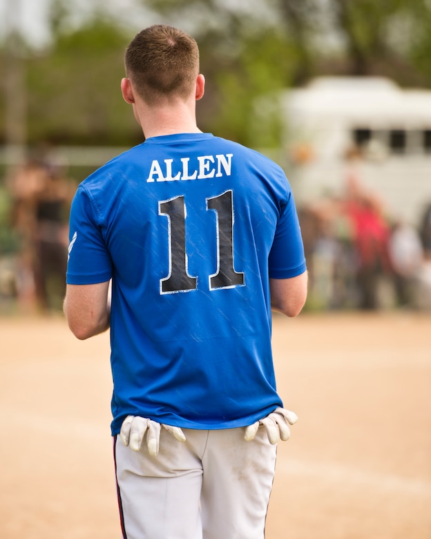 Staff Sgt. John Allen, 319th Communications Squadron high frequency global communications system operations manager, peers down the base line during the second annual Grand Forks Air Force Base vs. Minot AFB softball tournament May 20, 2016, at Roosevelt Park in Devils Lake, N.D. Allen was a member of the Air Force softball team the last four years and helped lead the Grand Forks AFB team to an 18-4 victory over Minot AFB. (U.S. Air Force photo by Airman 1st Class J.T. Armstrong/Released)