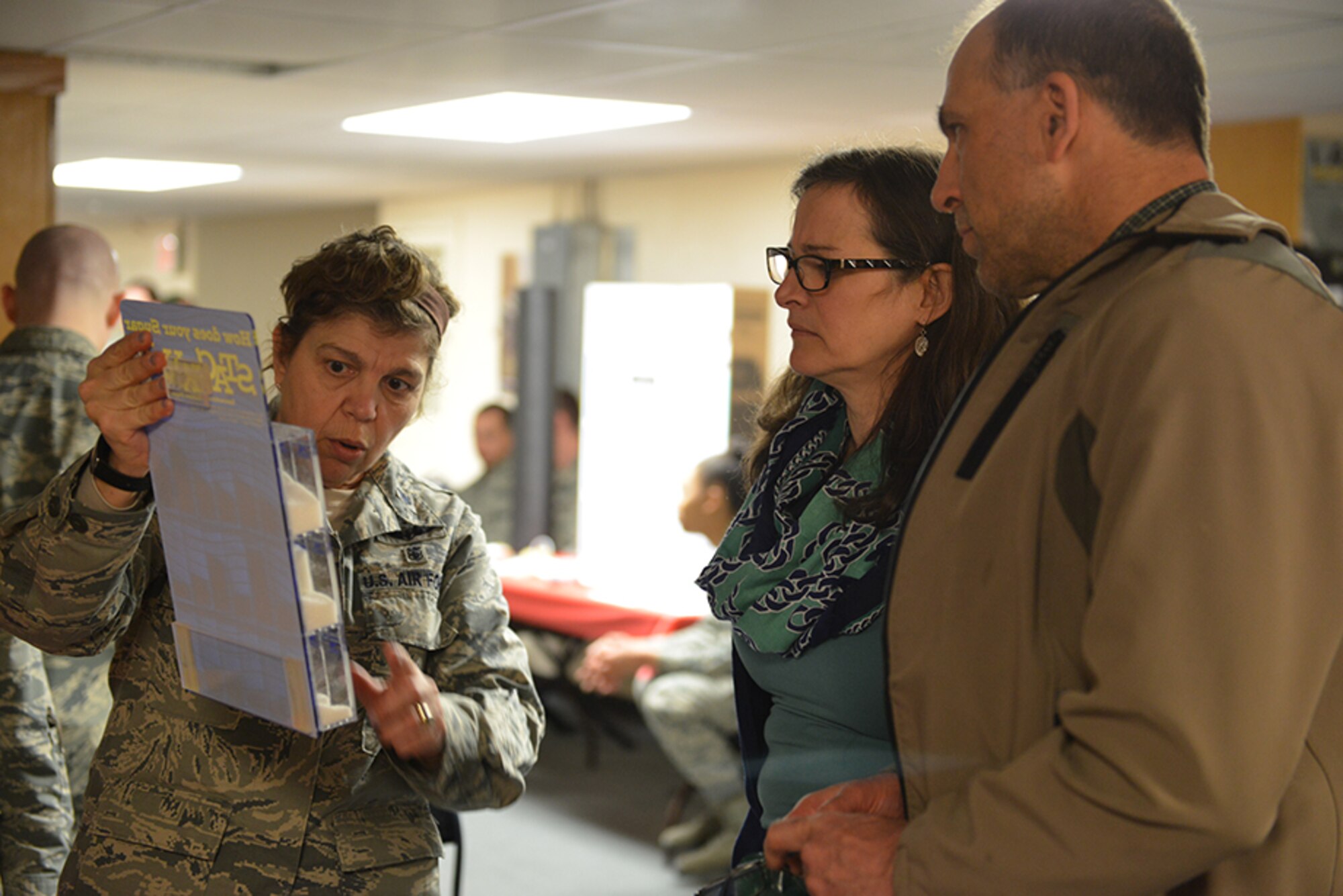 Attendees of the 30th annual Retiree Appreciation Day event meet with healthcare personnel in the basement of Building 600, on Joint Base Elmendorf-Richardson, Alaska, May 21, 2016.  Seventeen tables devoted to healthcare were set up in Building 600. (U.S. Air Force photo by Airman 1st Class Javier Alvarez)