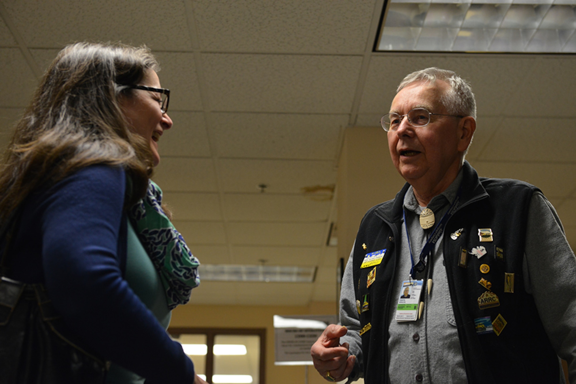 Gerald Forsyth, Military Society of Model Railroad Engineers public relations officer, discusses railroad history with Cynthia Hill, a teacher at Creekside Park Elementary School, at the 30th annual Retiree Appreciation Day event on Joint Base Elmendorf-Richardson, Alaska, May 21, 2016. The event provides an opportunity for the retired members of the community to meet with base leadership, said Maria Johnson, 673d Force Support Squadron retirement services officer. (U.S. Air Force photo by Airman 1st Class Javier Alvarez)