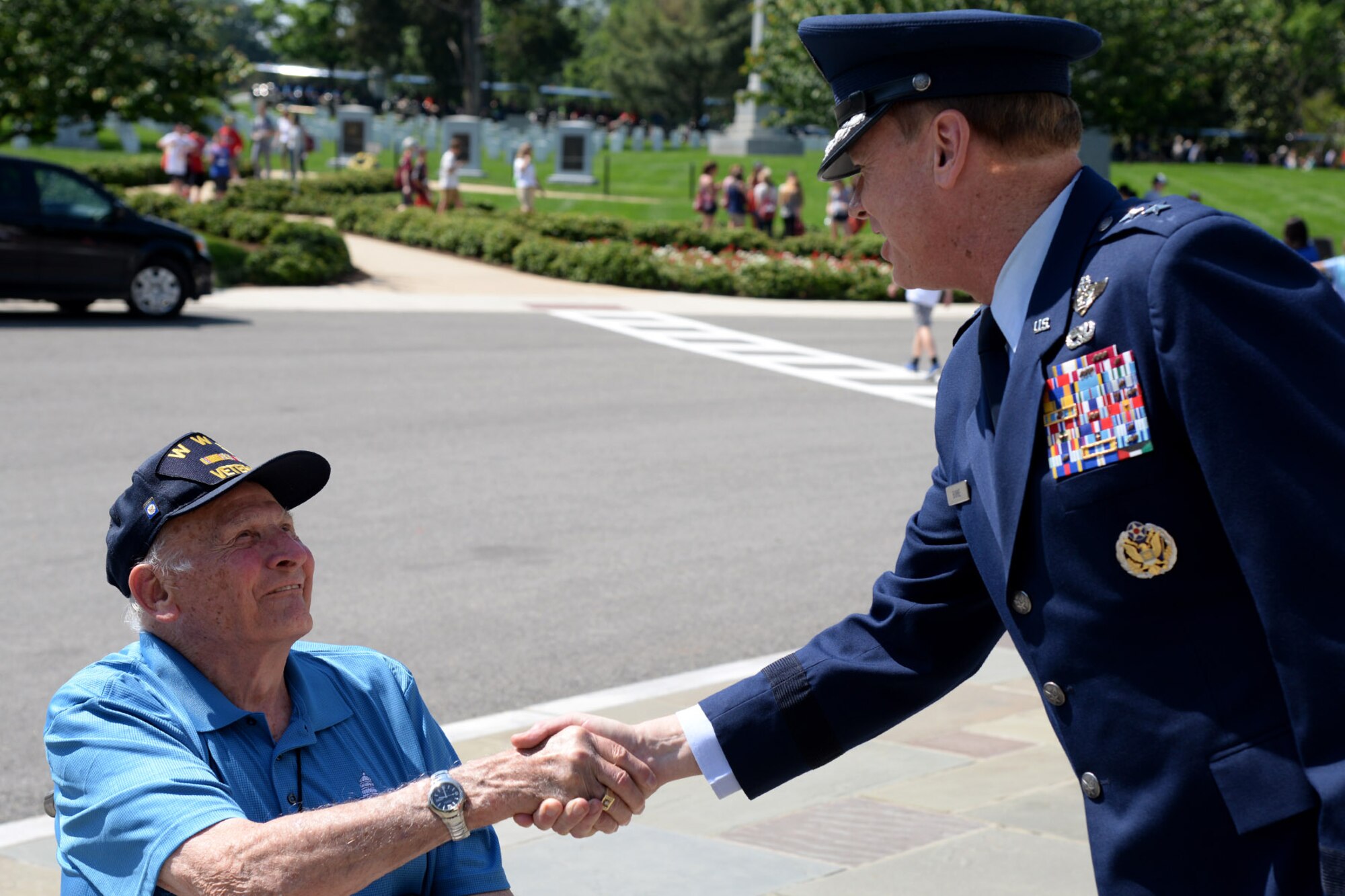 Air Force District of Washington Commander Maj. Gen. Darryl Burke greets
Vets Roll honoree and Navy Veteran Dick Miller while visiting the Tomb of
the Unknown Soldier for a wreath laying ceremony at Arlington National
Cemetery on May 24, 2016. The Vets Roll Project pays tribute to WW2 and
Korean War Veterans by taking them on a four day trip to Washington D.C. The
Air Force District of Washington brings air, space and cyberspace
capabilities to the joint team protecting the nation's capital, and supports
local personnel and those serving worldwide. (U.S. Air Force photo/Tech.
Sgt. Matt Davis)
