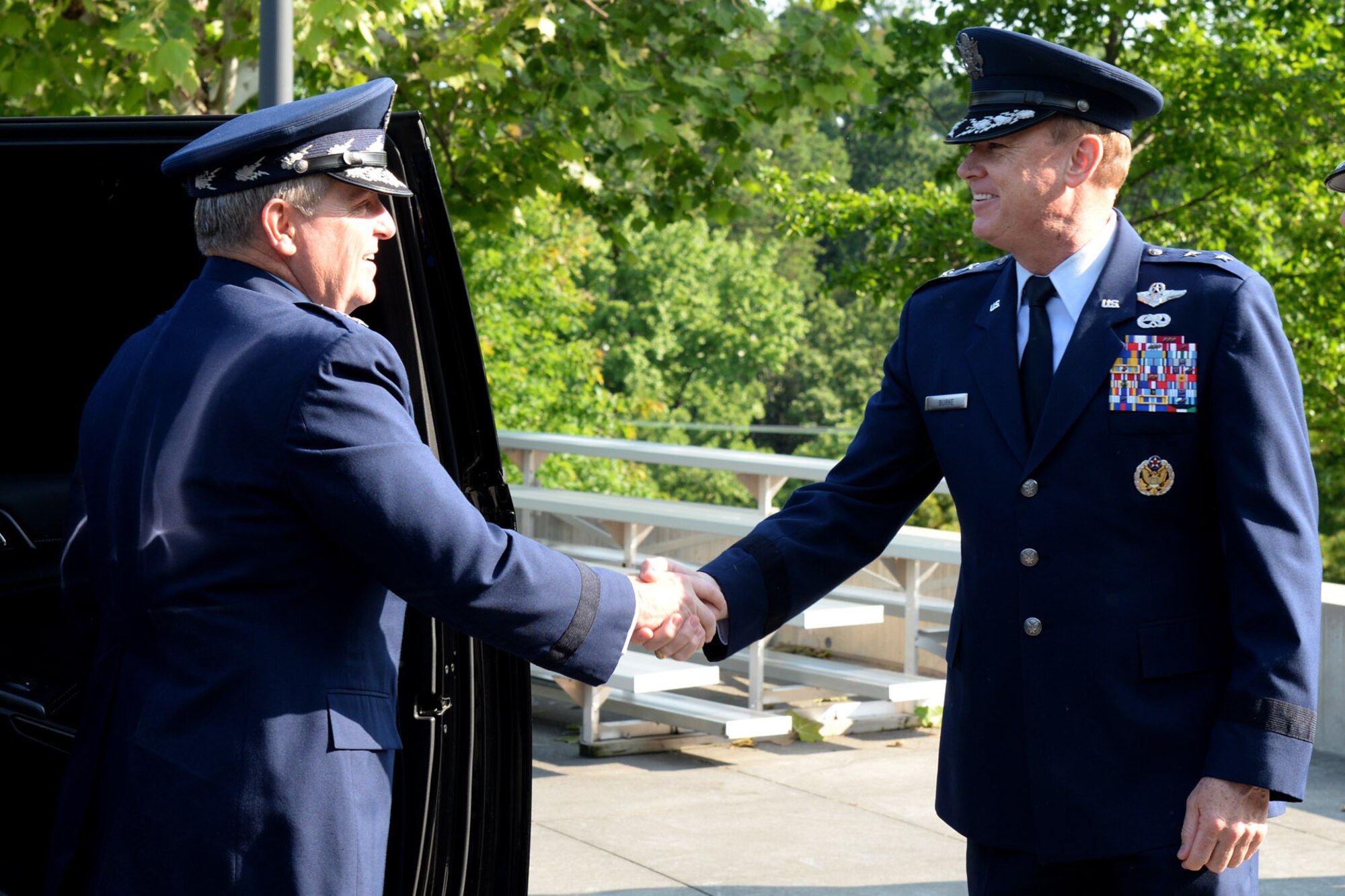 Air Force District of Washington Commander Maj. Gen. Darryl Burke greets Air
Force Chief of Staff Gen. Mark A. Welsh III before ceremonies begin
welcoming Maj. Gen. Laurian Anastasof, Chief of Air Staff of the Romanian
Air Force. Gen. Anastasof visited the National Capital Region as part of the
U.S. Air Force's Counterpart Visit Program. The Air Force District of
Washington brings air, space and cyberspace capabilities to the joint team
protecting the nation's capital, and supports local personnel and those
serving worldwide. (U.S. Air Force Photo/Tech. Sgt. Matt Davis)


