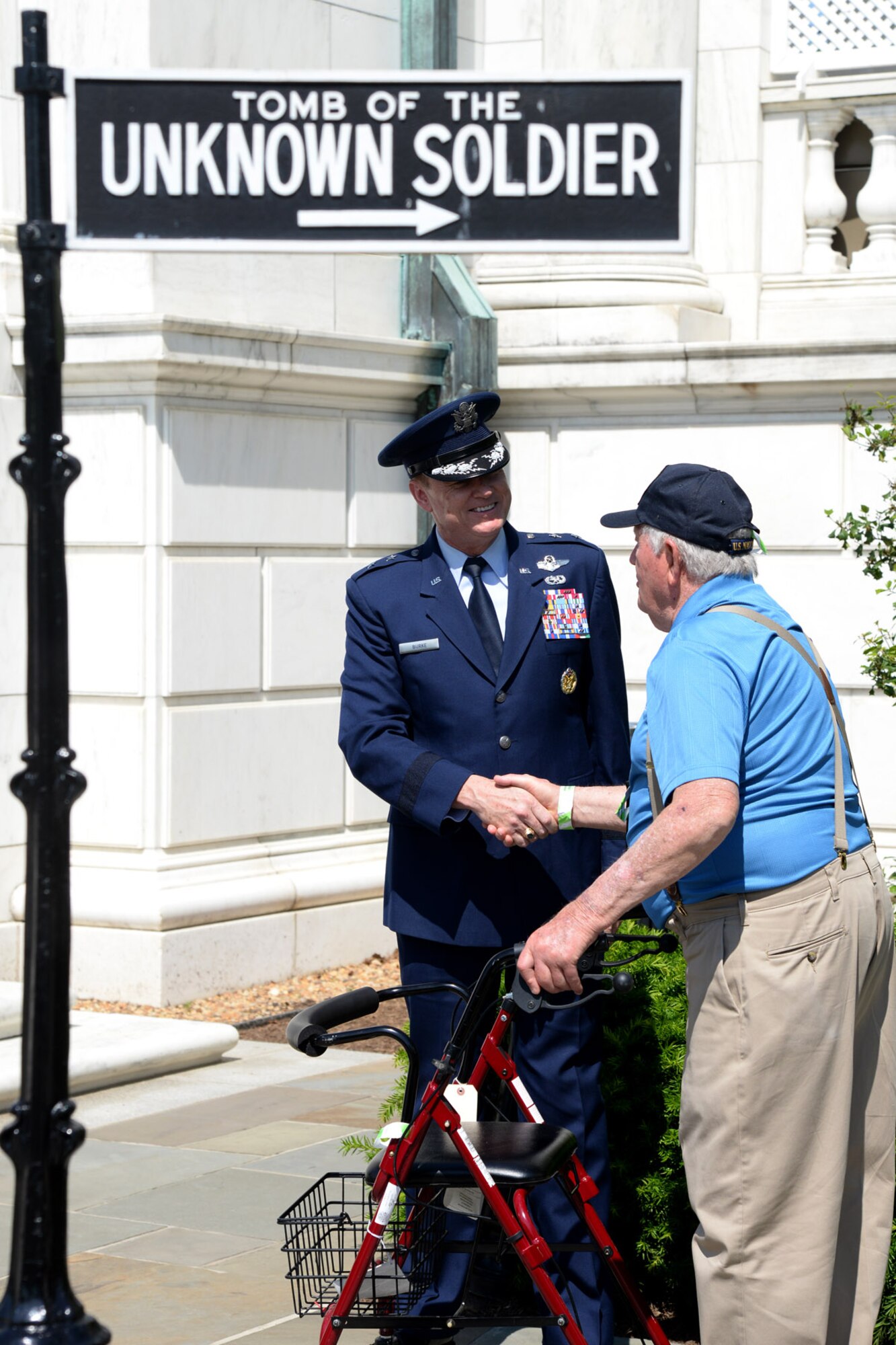 Air Force District of Washington Commander Maj. Gen. Darryl Burke greets a
Vets Roll honoree while visiting the Tomb of the Unknown Soldier for a
wreath laying ceremony at Arlington National Cemetery on May 24, 2016. The
Vets Roll Project pays tribute to WW2 and Korean War Veterans by taking them
on a four day trip to Washington D.C. The Air Force District of Washington
brings air, space and cyberspace capabilities to the joint team protecting
the nation's capital, and supports local personnel and those serving
worldwide. (U.S. Air Force photo/Tech. Sgt. Matt Davis)
