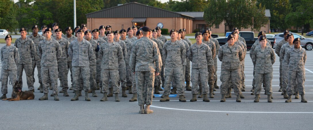 Members of the 78th Security Forces Squadron prepare for Reveille. (U.S. Air Force photo by Kenya Askew)