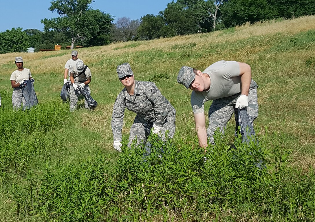 Airmen from the 136th Airlift Wing, Texas Air National Guard, stationed at the Naval Air Station Fort Worth Joint Reserve Base, helped clean up the community during participated in the annual Tarrant Regional Water District’s Spring Trash Bash, May 21, 2016. During the Trash Bash, more than 3,100 volunteers took part in picking up trash along the Trinity River. (Air National Guard photo by Senior Master Sgt. Elizabeth Gilbert/ released)