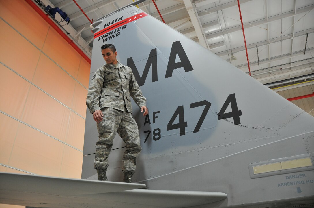 Staff Sgt. Trevor Tompkins of the Massachusetts Air National Guard, 104th Fighter Wing, inspects an F-15 Eagle aircraft during his daily preflight checks at Barnes Air National Guard Base. Tompkins was selected as the Continental U.S. North American Aerospace Control Alert Maintainer of the Year out of 16 ACA units throughout the Air Force. (U.S. Air National Guard photos by Master Sgt. Julie Avey) 