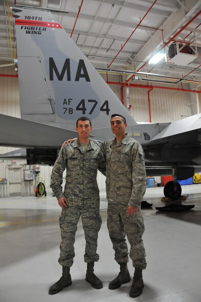 Staff Sgt. Trevor Tompkins, right, and Staff Sgt. Brian Boudreau, left, of the Massachusetts Air National Guard, 104th Fighter Wing, take a photo together at Barnes Air National Guard Base. The two Airmen are crew chiefs who are A Man and B man on a team together to inspect aircraft prior to departure. The crew chiefs are in sync together as Wingmen, mirroring each others actions and calling out their movements to each other to ensure safety and accuracy. 