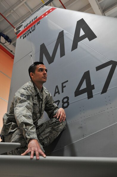 Staff Sgt. Trevor Tompkins of the Massachusetts Air National Guard, 104th Fighter Wing, inspects an F-15 Eagle aircraft during his daily preflight checks at Barnes Air National Guard Base. Tompkins was selected as the Continental U.S. North American Aerospace Defense Command Region First Air Force Aerospace control Alert Maintainer of the Year out of 16 ACA units throughout the Air Force. (U.S. Air National Guard photos by Master Sgt. Julie Avey) 