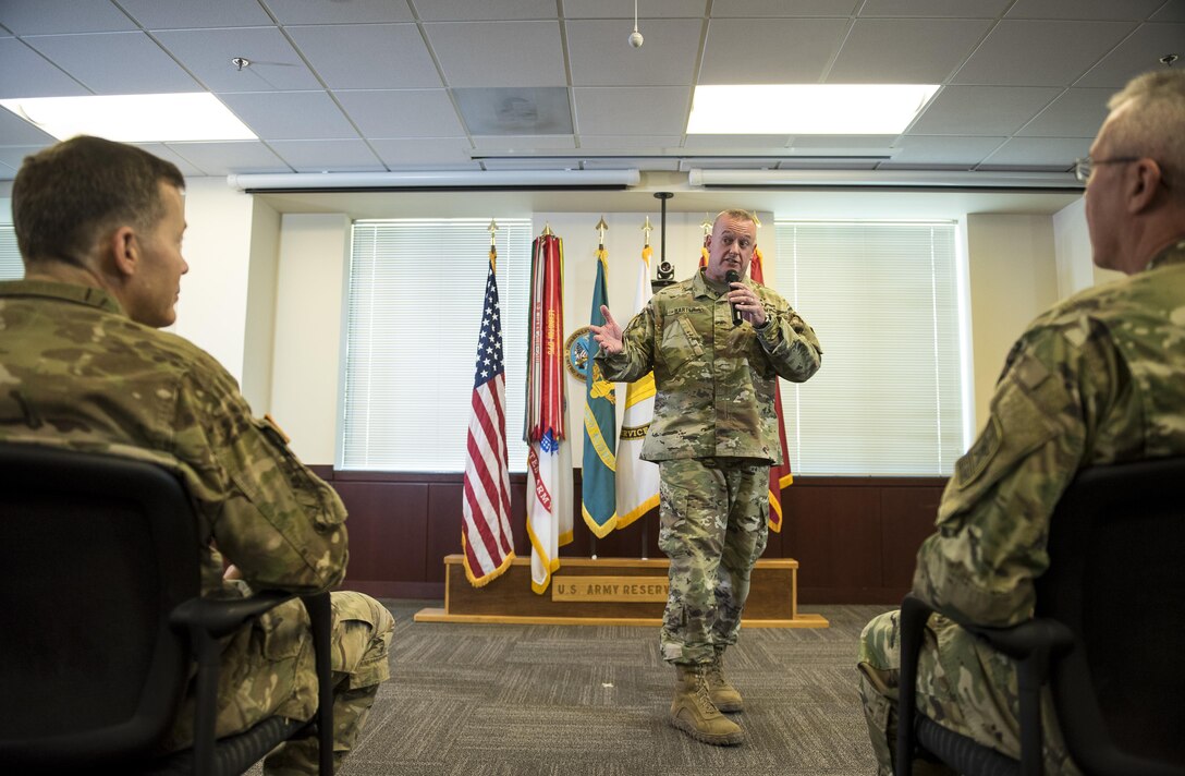 Brig. Gen. Robert Harter, chief of staff for the Office of the Chief of Army Reserve (OCAR), opens the forum to the final town hall meeting conducted by Lt. Gen. Jeffrey Talley, chief of the U.S. Army Reserve, at Fort Belvoir, Virginia, which was broadcasted live across the internet for viewers to participate from around the world, May 24. During the meeting, Talley spoke on a variety of topics affecting the Army Reserve and answered questions from both the online and live audiences. (U.S. Army photo by Master Sgt. Michel Sauret)