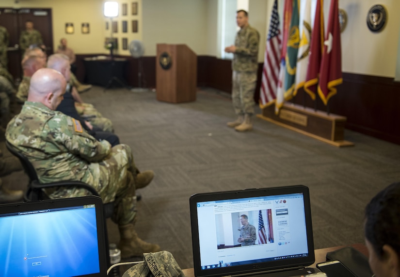 A laptop screen connected online feeds a live broadcast of Lt. Gen. Jeffrey Talley, chief of the U.S. Army Reserve, conducting his final town hall meeting at Fort Belvoir, Virginia, which was broadcasted live across the internet for viewers to participate from around the world, May 24. During the meeting, Talley spoke on a variety of topics affecting the Army Reserve and answered questions from both the online and live audiences. (U.S. Army photo by Master Sgt. Michel Sauret)
