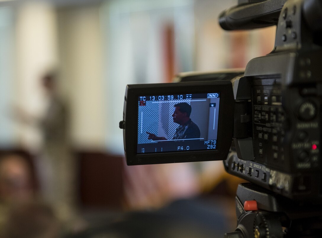 A videocamera feeds live footage to an online audience as Lt. Gen. Jeffrey Talley, chief of the U.S. Army Reserve, conducts his final town hall meeting at Fort Belvoir, Virginia, which was broadcasted live across the internet for viewers to participate from around the world, May 24. During the meeting, Talley spoke on a variety of topics affecting the Army Reserve and answered questions from both the online and live audiences. (U.S. Army photo by Master Sgt. Michel Sauret)