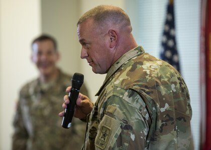 Brig. Gen. Robert Harter, chief of staff for the Office of the Chief of Army Reserve (OCAR), asks a question during the final town hall meeting conducted by Lt. Gen. Jeffrey Talley, chief of the U.S. Army Reserve, at Fort Belvoir, Virginia, which was broadcasted live across the internet for viewers to participate from around the world, May 24. During the meeting, Talley spoke on a variety of topics affecting the Army Reserve and answered questions from both the online and live audiences. (U.S. Army photo by Master Sgt. Michel Sauret)