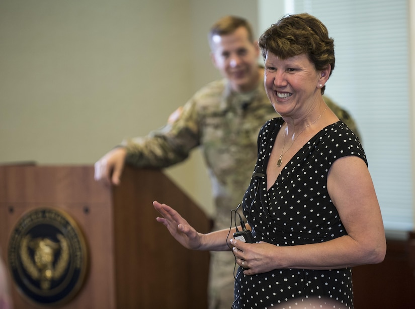 Linda Talley, wife of Lt. Gen. Jeffrey Talley, chief of the U.S. Army Reserve, jokes with the audience over what advice she would give the incoming general's wife during Talley's final town hall meeting at Fort Belvoir, Virginia, which was broadcasted live across the internet for viewers to participate from around the world, May 24. During the meeting, Talley spoke on a variety of topics affecting the Army Reserve and answered questions from both the online and live audiences. (U.S. Army photo by Master Sgt. Michel Sauret)