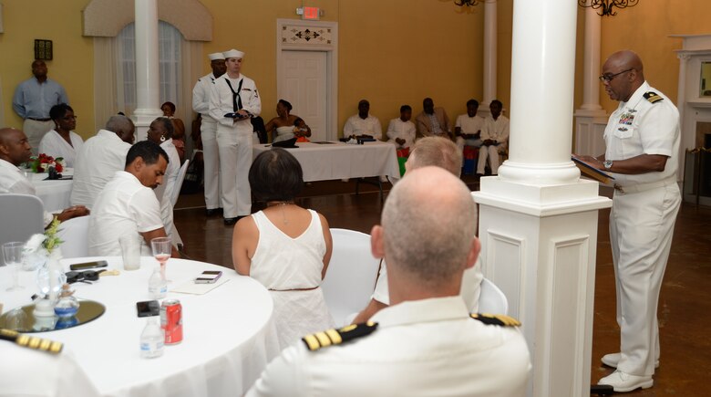 Lt. Cmdr. Donald Mitchell, senior nurse executive, Naval Branch Health Clinic-Albany, aboard Marine Corps Logistics Base Albany, retires after 30-years of active-duty service in the Navy at a “fair winds” celebration in Orange Park, Florida, May 14. During the event, Mitchell, who kicked-off his own retirement ceremony before a standing-room-only crowd of witnesses, read one rendition of “Old Glory,” and presented American flags to his wife and mother, respectively. Family and friends, donned in a sea of U.S. Navy summer uniforms and white civilian attire, poured into the Orange Park Women’s Club to celebrate the honoree.
