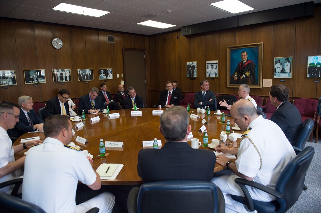 Defense Secretary Ash Carter speaks with U.S. Naval College leadership while visiting the campus in Newport, R.I., May 25, 2016. DoD photo by Air Force Senior Master Sgt. Adrian Cadiz