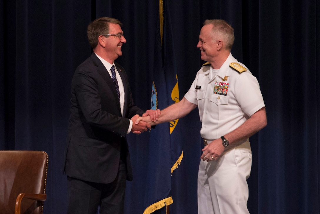 Defense Secretary Ash Carter thanks Navy Rear Adm. P. Gardner Howe III, president of the U.S. Naval War College, after participating in a moderated discussion at the college during a visit to the campus in Newport, R.I., May 25, 2016. DoD photo by Air Force Senior Master Sgt. Adrian Cadiz