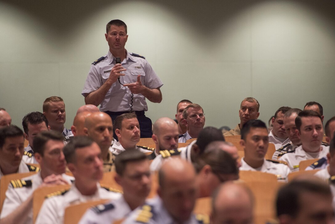 A U.S. Naval War College student asks Defense Secretary Ash Carter a question as Carter participates in a moderated discussion with Phil Haun, the college's dean of academics, during a visit to the campus in Newport, R.I., May 25, 2016. DoD photo by Air Force Senior Master Sgt. Adrian Cadiz