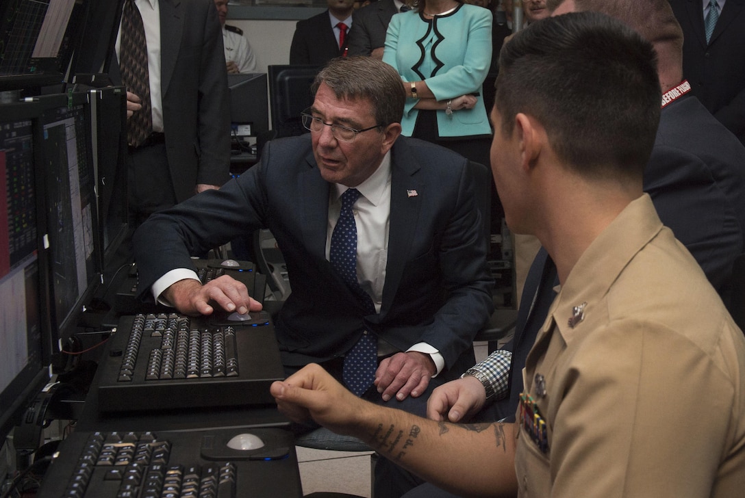 Defense Secretary Ash Carter receives a briefing on the capabilities of Advanced Weapons Enhanced by Submarine UAS against Mobile targets, known as Awesum, during a visit to the Naval Undersea Warfare Center in Newport, R.I., May 25, 2016. DoD photo by Air Force Senior Master Sgt. Adrian Cadiz