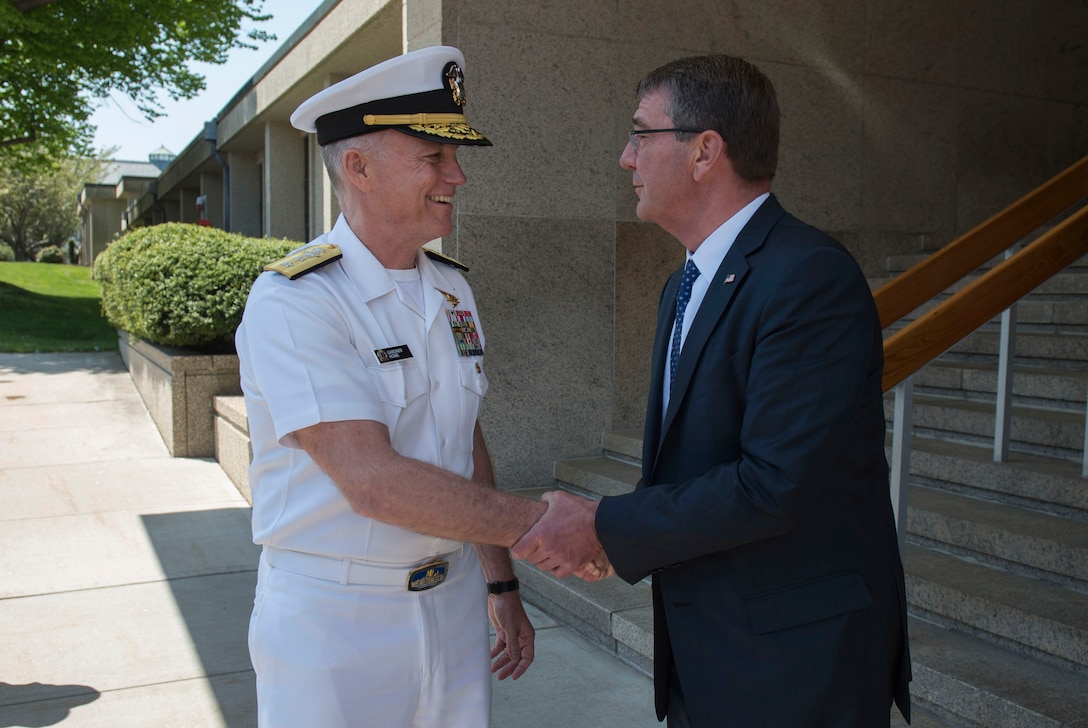 Defense Secretary Ash Carter says goodbye to Navy Rear Adm. P. Gardner Howe III, president of the U.S. Naval War College, after participating in a moderated discussion at the college during a visit to the campus in Newport, R.I., May 25, 2016. DoD photo by Air Force Senior Master Sgt. Adrian Cadiz