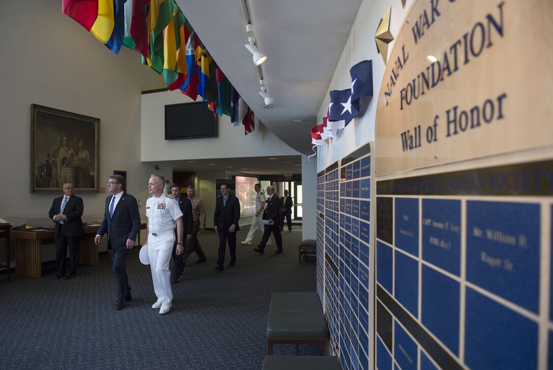 Defense Secretary Ash Carter walks with Navy Rear Adm. P. Gardner Howe III, president of the U.S. Naval War College, after participating in a moderated discussion at the college during a visit to the campus in Newport, R.I., May 25, 2016. DoD photo by Air Force Senior Master Sgt. Adrian Cadiz