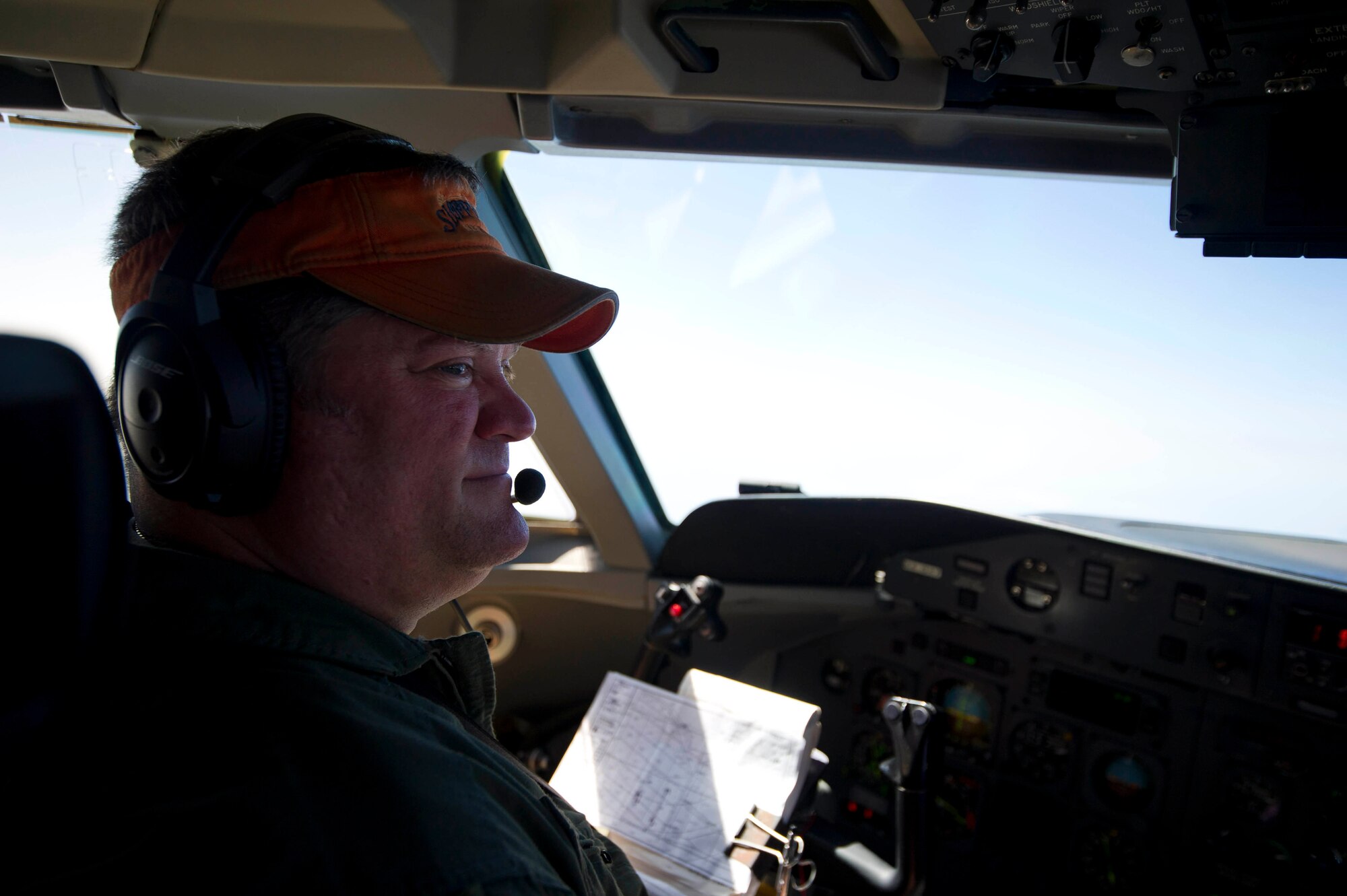 Garry Acree, 82nd Aerial Target Squadron E-9A Widget pilot, scans the horizon during a mission, May 19, at Tyndall Air Force Base. Some of the roles performed by the aircraft include sea surveillance, telemetry and radio relay. (U.S. Air Force photo by Senior Airman Dustin Mullen/Released)