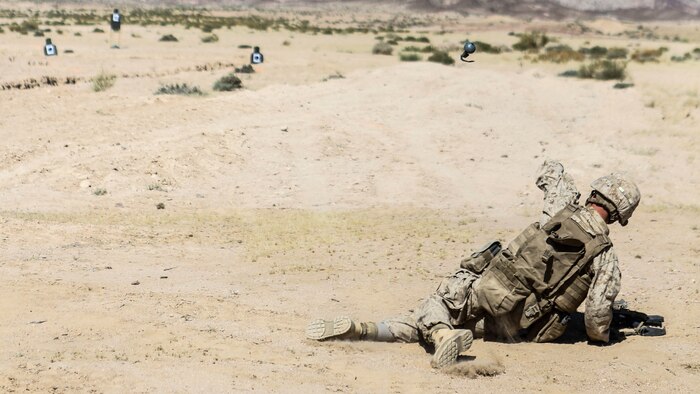 A Marine with 1st Battalion, 2nd Marine Regiment, 2nd Marine Division tosses a training grenade during a squad attacks exercise in Al Quweyrah, Jordan, May 19, 2016. Eager Lion is a recurring exercise between partner nations designed to strengthen military-to-military relationships, increase interoperability, and enhance regional security and stability. 