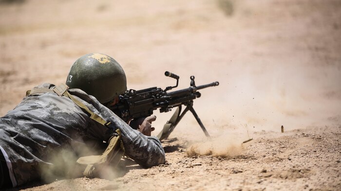 A member the Jordanian 77th Marines Battalion engages targets during a squad attacks exercise in Al Quweyrah, Jordan, May 19, 2016. Eager Lion is a recurring exercise between partner nations designed to strengthen military-to-military relationships, increase interoperability, and enhance regional security and stability. 