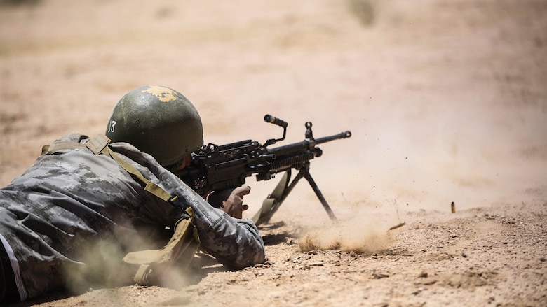 A member the Jordanian 77th Marines Battalion engages targets during a squad attacks exercise in Al Quweyrah, Jordan, May 19, 2016. Eager Lion is a recurring exercise between partner nations designed to strengthen military-to-military relationships, increase interoperability, and enhance regional security and stability. 