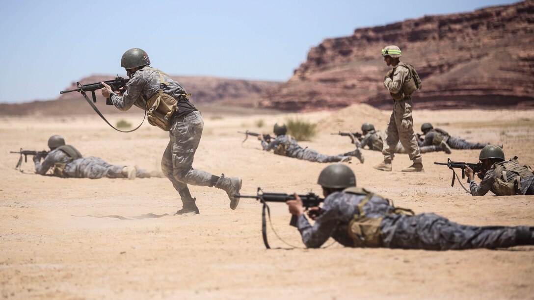 Members of the Jordanian 77th Marines Battalion engage targets during a squad attacks exercise in Al Quweyrah, Jordan, May 19, 2016. Eager Lion is a recurring exercise between partner nations designed to strengthen military-to-military relationships, increase interoperability, and enhance regional security and stability. 