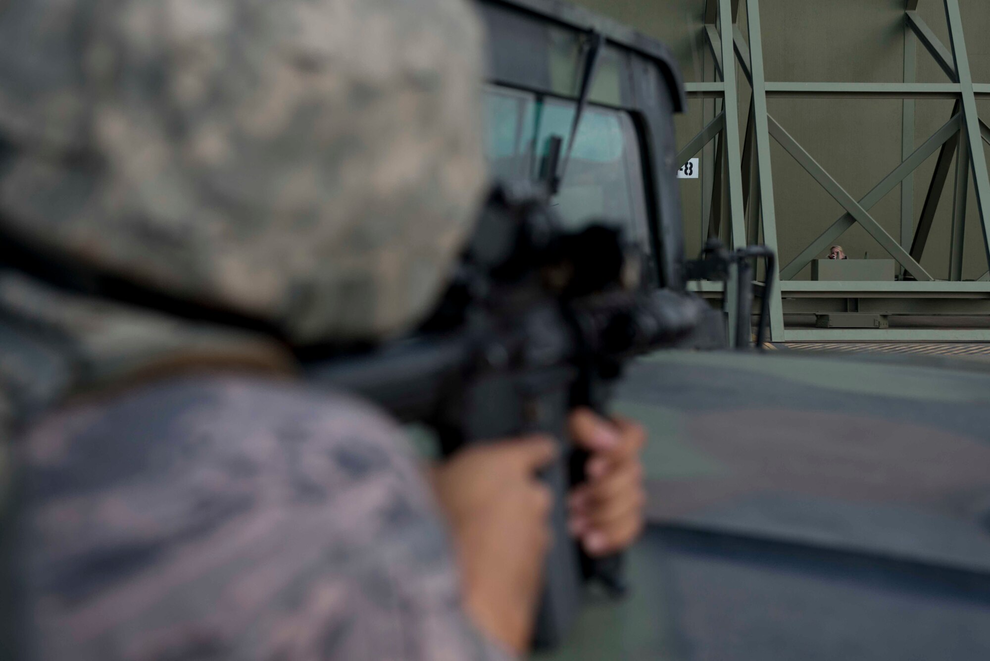 Airman 1st Class Sidney Carrier, 39th Security Forces Squadron security response team member, engages a simulated opposing forces member during an exercise May 18, 2016, at Incirlik Air Base, Turkey. SFS Airmen are charged with protecting the installation. (U.S. Air Force photo by Senior Airman John Nieves Camacho/Released)