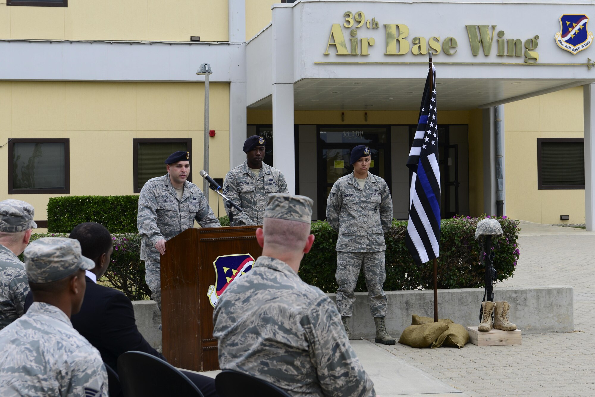 U.S. Air Force Lt. Col. Joseph Musacchia, 39th Security Forces Squadron commander, speaks to those in attendance during a National Police Week retreat ceremony May 15, 2016, at Incirlik Air Base, Turkey. Defenders and their counterparts dedicated this time to remember fallen comrades. (U.S. Air Force photo by Staff Sgt. Caleb Pierce/Released) 