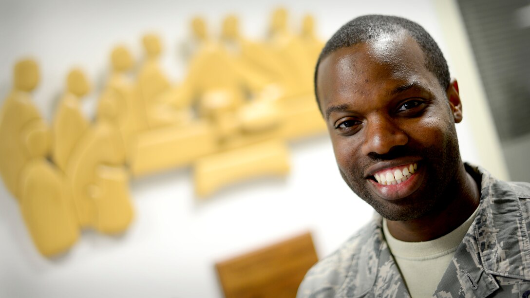 Staff Sgt. Terrence Williams, 31st Fighter Wing Chapel Resource Management NCO in charge, was named the 31st Fighter Wing’s “Wyvern Warrior of the Week,” May 25, 2016, at Aviano Air Base, Italy. Williams was recognized by Col. Bryan Wolford, 31st Fighter Wing vice commander, for going above and beyond in his dedication to the mission. (U.S. Air Force photo by Senior Airman Areca T. Bell/Released)
