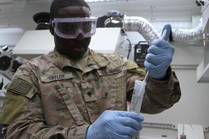 U.S. Army Spc. Terek E. Taylor, petroleum laboratory specialists with Alpha Company, 640th Aviation Sustainment Battalion, 40th Combat Aviation Brigade, performs quality surveillance of fuel received, at Camp Arifjan, Kuwait, June 14, 2016. The 1st Sustainment Command (Theater) performs laboratory inspections quarterly and annually. (U.S. Army photo by Sgt. 1st Class Naurys Marte/Released)
