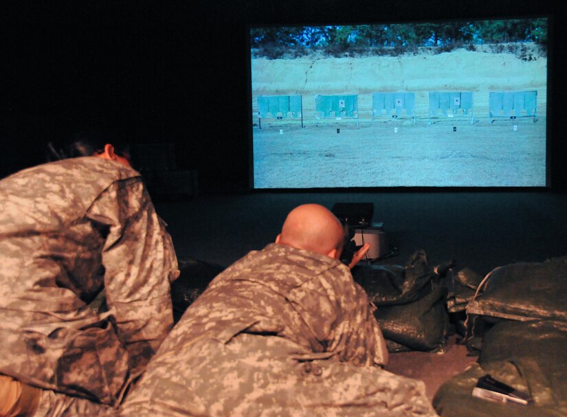 Soldiers of the Army Reserve’s 99th Regional Support Command practice rifle marksmanship using the Engagement Skills Trainer, a virtual rifle range that allows Soldiers to practice shooting in a video game-style environment without expending actual rounds.