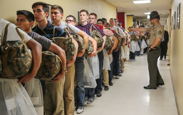 Staff Sgt. Joshua M. Cardona, chief drill instructor, Receiving Company, Support Battalion, gives recruits instructions during receiving at Marine Corps Recruit Depot San Diego, May 23. Recruits are required to follow all instructions from drill instructors throughout the course of training. In the following week of receiving, they will conduct an initial strength test, undergo medical screenings and immunizations and learn the basic rules of recruit training. Annually, more than 17,000 males recruited from the Western Recruiting Region are trained at MCRD San Diego. Alpha Company is scheduled to graduate Aug. 19.