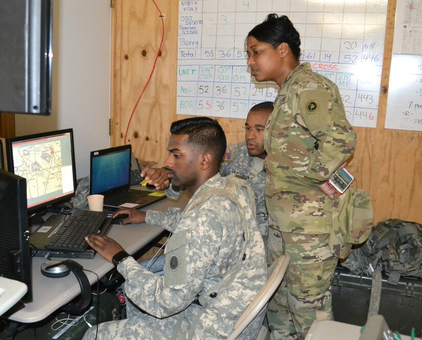 Col. Toni Glover, 650th Regional Support Group commanding officer, is briefed on the 314th Combat Sustainment Support Command’s communications network at Fort Polk during Joint Readiness Training Center exercises May 7, where units from the U.S. Army National Guard, Army Reserve and active-duty Army train together.