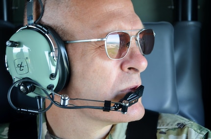 Col. David Pinter, Fort McCoy garrison commander views the extensive training capabilities provided by the Range Complex during an aerial tour on Fort McCoy, Wis., May 23.

As a Total Force Training Center, Ft. McCoy's primary responsibility is to support the training and readiness of military personnel and units of all branches and components of America's armed forces.