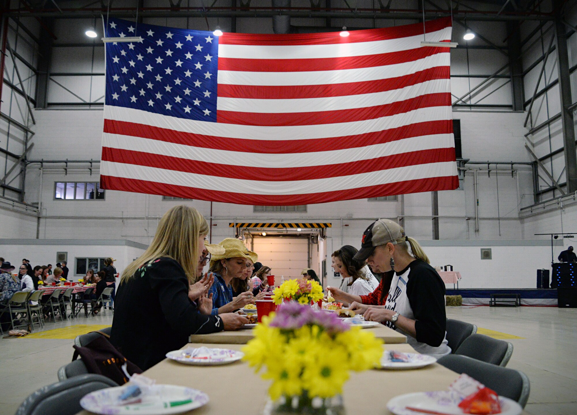 Team Mildenhall spouses eat during a Spouse Appreciation Dinner May 24, 2016, on RAF Mildenhall, England. The dinner is one of many events the Mildenhall Spouses’ Club has hosted. (U.S. Air Force photo by Senior Airman Christine Halan/Released)