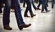 Team Mildenhall spouses line dance during a Spouse Appreciation Dinner May 24, 2016, on RAF Mildenhall, England. Spouses had a barbecue dinner, played games, and rode a bull riding. (U.S. Air Force photo by Senior Airman Christine Halan/Released)