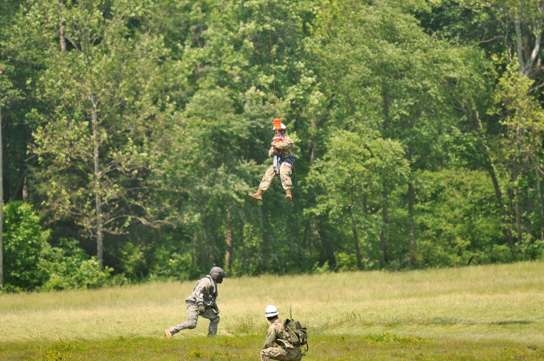 A joint aviation exercise between Army Reserve, active duty and National Guard soldiers in the District of Columbia at Fort Belvoir’s Davison Army Airfield Wednesday, May 25th 2016. This was the first multi-day, multi-component contingency mission exercise held in recent history. Refueling, sling load and hoist operations as well as a mixed multi-ship formation flight over D.C. involving Army Reserve CH-47 “Chinooks”, active duty UH-60 “Black Hawks,” National Guard LUH-72 “Lakotas”, and an Air Force UH-1 “Huey” showcase the Total Army’s ability to support the National Defense Strategy and Army commitments at home and around the world. (Photo by Capt. Xeriqua Garfinkel, U.S. Army Reserve/Released)