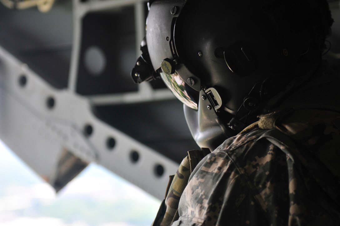 A joint aviation exercise between Army Reserve, active duty and National Guard soldiers in the District of Columbia at Fort Belvoir’s Davison Army Airfield Wednesday, May 25th 2016. This was the first multi-day, multi-component contingency mission exercise held in recent history. Refueling, sling load and hoist operations as well as a mixed multi-ship formation flight over D.C. involving Army Reserve CH-47 “Chinooks”, active duty UH-60 “Black Hawks,” National Guard LUH-72 “Lakotas”, and an Air Force UH-1 “Huey” showcase the Total Army’s ability to support the National Defense Strategy and Army commitments at home and around the world. (Photo by Capt. Xeriqua Garfinkel, U.S. Army Reserve/Released)