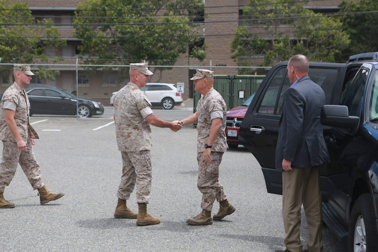 U.S. Marine Corps Gen. Robert Neller, Commandant of the Marine Corps, meets with Brig. Gen. David Ottignon, commanding general, 1st Marine Logistics Group to talk about the current and future 3D printing operations using the Expeditionary Manufacturing System within the 1st MLG on Camp Pendleton, Calif., May 24, 2016. The Expeditionary Manufacturing System is a mobile 3D printing and milling shop designed to provide quick turnaround for mission critical parts in deployed environment. (U.S. Marine Corps photo by Sgt. Rodion Zabolotniy, Combat Camera, Camp Pendleton/RELEASED)
