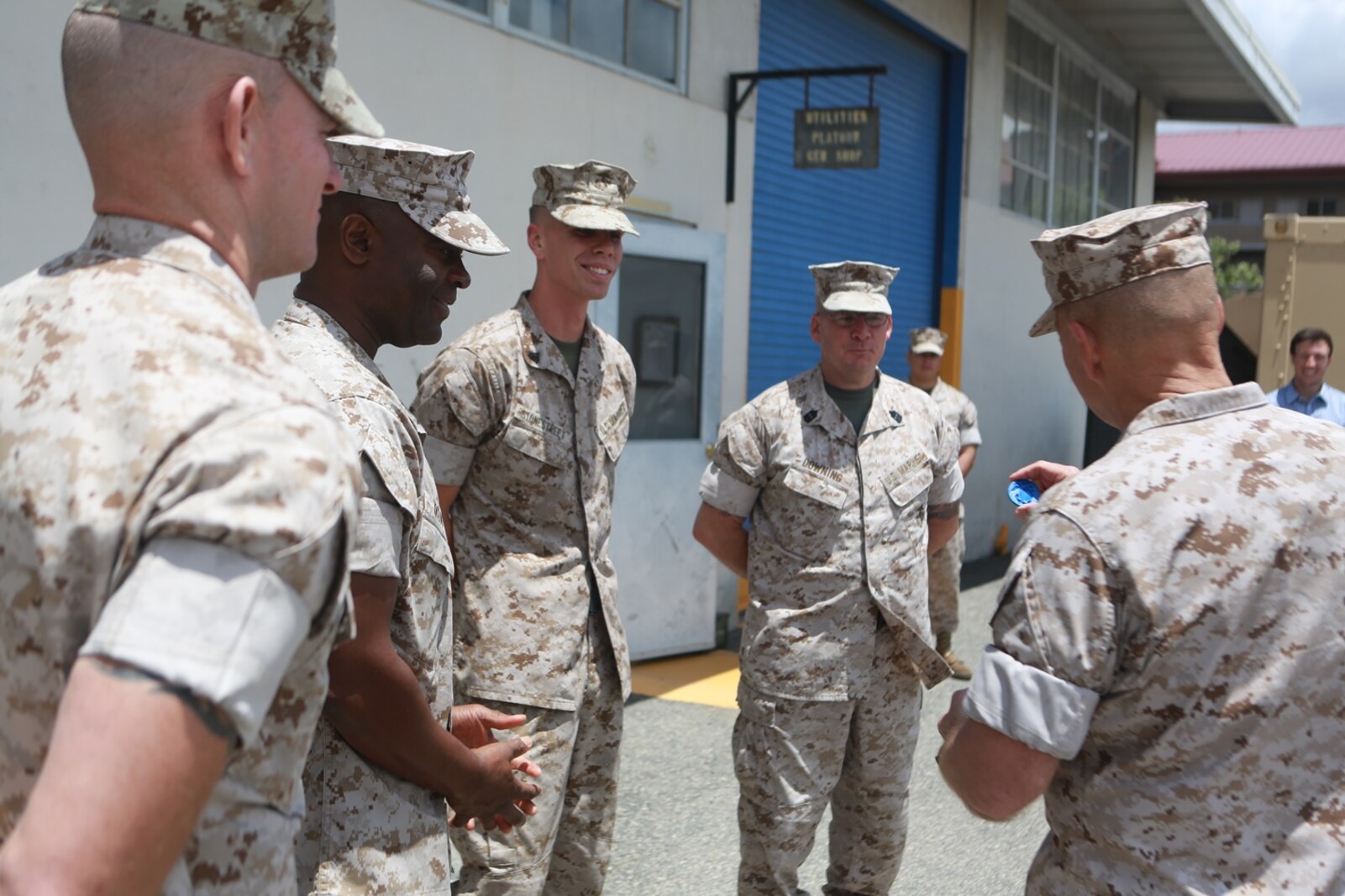 U.S. Marine Corps Gen. Robert Neller, Commandant of the Marine Corps, is presented a 3D printed Eagle Globe and Anchor from the Marines of 1st Maintenance Battalion, Combat Logistics Regiment 15, 1st Marine Logistics Group on Camp Pendleton, Calif., May 24, 2016. Gen. Neller addressed the future of the Marine Corps and answered questions from the Marines. (U.S. Marine Corps photo by Sgt. Rodion Zabolotniy, Combat Camera, Camp Pendleton/RELEASED)