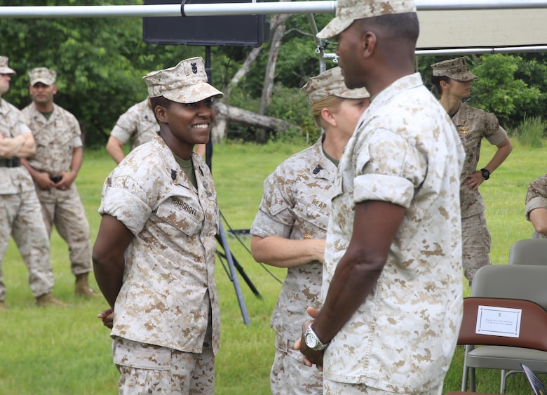 NAVAL SUPPORT FACILITY INDIAN HEAD, Md. – Master Chief Petty Officer Mercedes Hargrove, left, Navy senior enlisted advisor for Chemical Biological Incident Response Force (CBIRF), speaks to Sgt. Maj. Christopher Robinson, U.S. Marine Corps Forces Command (MARFORCOM)  sergeant major, prior to CBIRF change of command. Col. Michael L. Carter assumed command of CBIRF, MARFORCOM,  from Col. Stephen E. Redifer during a change of command ceremony aboard Naval Support Facility Indian Head, Md., May 18, 2016. Carter thanked Redifer for his outstanding work with CBIRF and said he was thankful for the opportunity to take command of the Nation’s premier chemical, biological, radiological, nuclear and high-yield explosives (CBRNE) consequence management and incident response force in readiness. (U.S. Marine Corps by Sgt. Jonathan S. Herrera/Released)