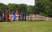 Chemical Biological Incident Response Force (CBIRF) march in formation during its Change of Command Ceremony. Col. Michael L. Carter assumed command of Chemical Biological Incident Response Force (CBIRF), U.S. Marine Corps Forces Command (MARFORCOM),  from Col. Stephen E. Redifer during a change of command ceremony aboard Naval Support Facility Indian Head, Md., May 18, 2016. Carter thanked Redifer for his outstanding work with CBIRF and said he was thankful for the opportunity to take command of the Nation’s premier chemical, biological, radiological, nuclear and high-yield explosives (CBRNE) consequence management and incident response force in readiness. (U.S. Marine Corps by Sgt. Jonathan S. Herrera/Released)