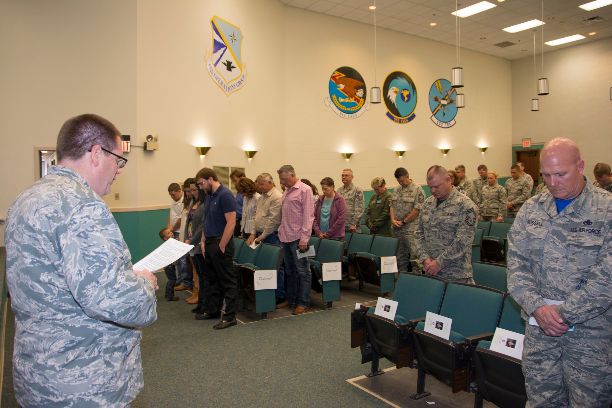 Ch. (Lt. Col.) Dwight Magnus, 507th Air Refueling Wing Chaplain, leads an invocation during a retirement ceremony May 15, 2016, at Tinker Air Force Base, Okla. Magnus and his chapel staff were awarded the Air Force Reserve Command Chaplain Ministry of Presence Award for 2015. (U.S. Air Force photo/Tech. Sgt. Lauren Gleason)