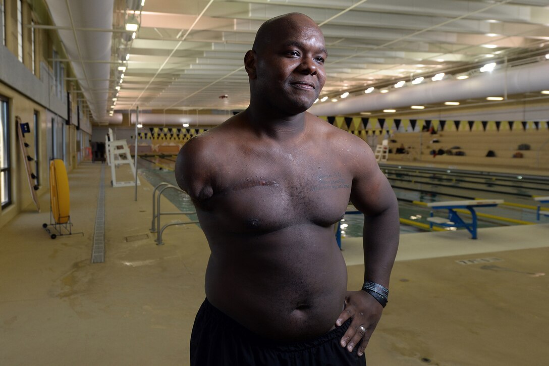 Retired Army Spc. Haywood Range III poses for a photo after a swimming event during the Army Trials for last year’s Department of Defense Warrior Games held at Fort Bliss in El Paso, Texas, March 27, 2015. Athletes in this year’s trials are competing for a spot on the Army’s team in the 2016 Department of Defense Warrior Games. DoD photo by EJ Hersom