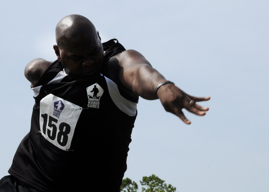 Army medically retired Spc. Haywood Range III throws the shot put during last year’s DoD Warrior Games held at Marine Corps Base Quantico, Va., June 23, 2015. Range earned a gold medal in the men's standing 5.0 division. DoD photo by Shannon Collins