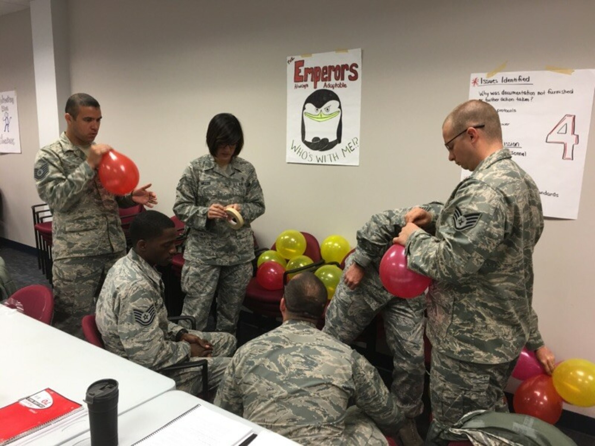 A group of NCOs work together to design and construct a free-standing tower made out of balloons as part of a team development exercise during the Air Force Reserve Command NCO Leadership Development Course held at the Pittsburgh International Airport Air Reserve Station, Pa., May 10, 2016. The course provided mid-level enlisted personnel with hands-on experience in leadership and management practices through guided discussions, role-playing exercises, and learning activities. (U.S. Air Force courtesy photo)