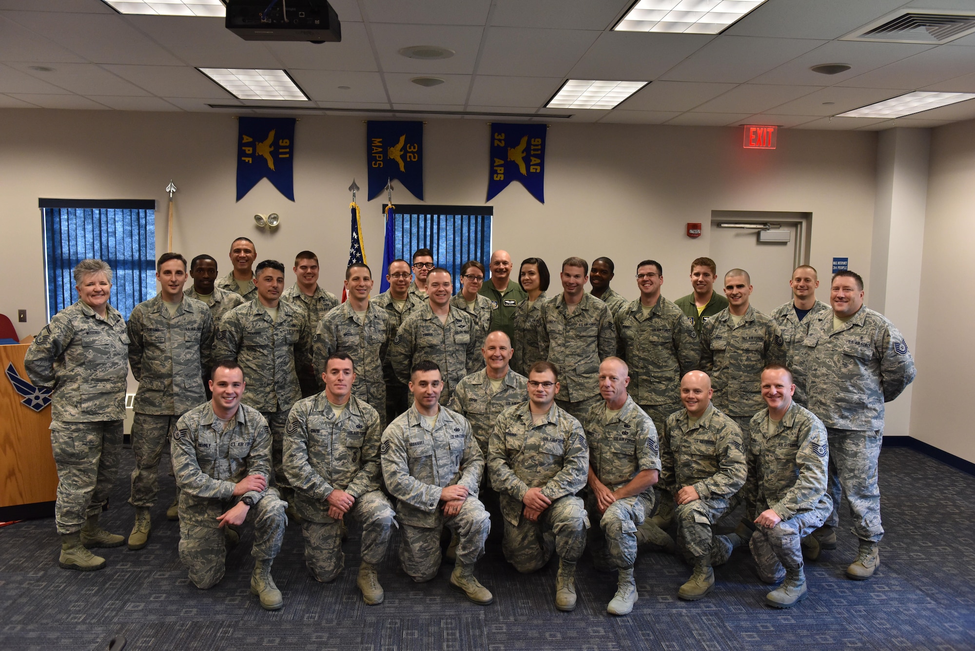 The latest NCO Leadership Development Course pose for a picture before their graduation ceremony at the Pittsburgh International Airport Air Reserve Station, Pa., May 13, 2016. NCOLDC is a week-long course to teach and reinforce leadership and management practices in future leaders. (U.S. Air Force photo by Airman Bethany Feenstra)